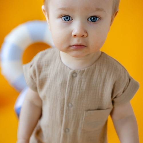 Rampers niemowlęcy muślinowy Elephant  Eevi - beżowy