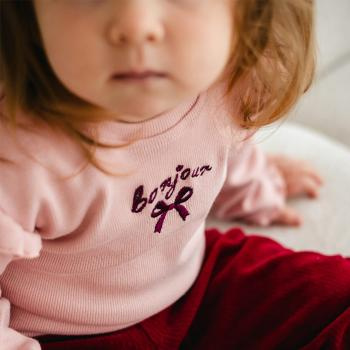 Różowa bluzka niemowlęca Eevi z falbankami – Fluffy Tails