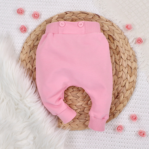 Spodnie dresowe z bawełny organicznej Kolorowe kwiatki Nini różowy 