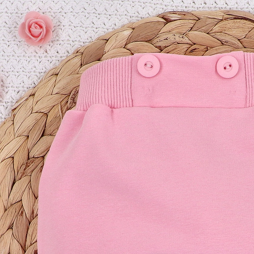 Spodnie dresowe z bawełny organicznej Kolorowe kwiatki Nini różowy 