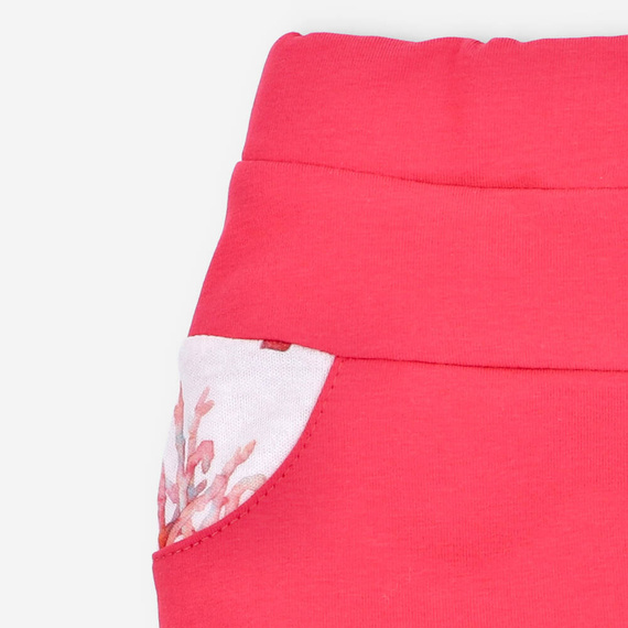 Spodnie dresowe z bawełny organicznej Ocean Nini różowy