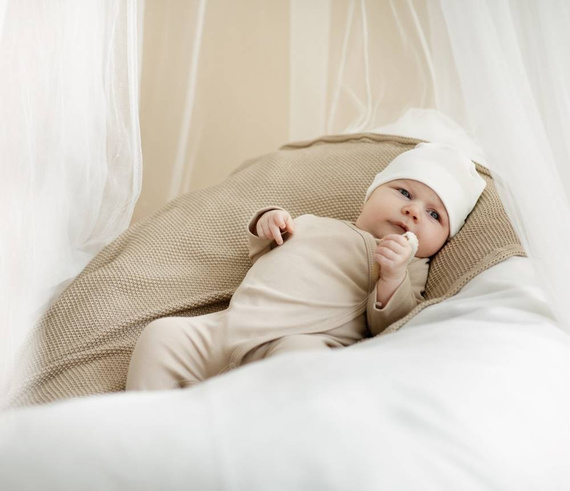 Pajac niemowlęcy wiązany Lovely Day Pinokio - beżowy