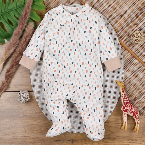 Pajacyk z bawełny organicznej zapinany kopertowo Kreski Nini kremowy