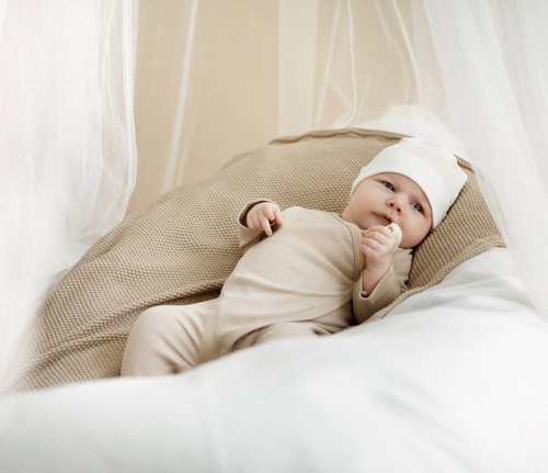 Pajac niemowlęcy wiązany Lovely Day Pinokio - beżowy