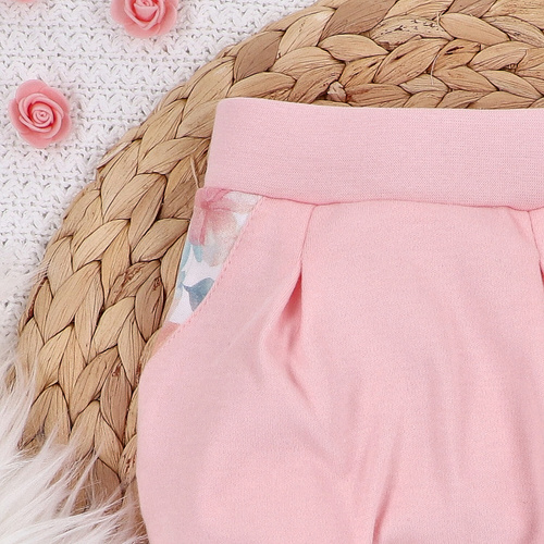 Spodnie z bawełny organicznej Kolorowe kwiatki Nini różowy 