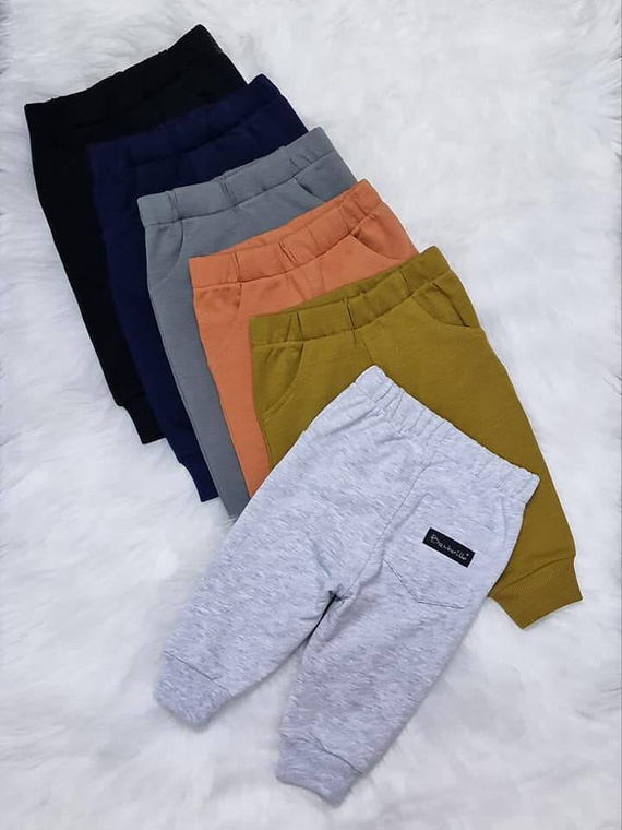 Spodnie dziecięce Piotruś Bambarillo łososiowy