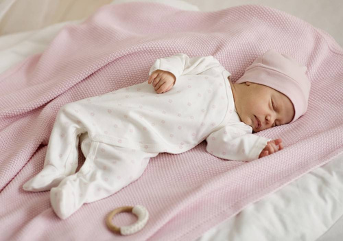 Pajac niemowlęcy wiązany Lovely Day Pinokio - rose ecru