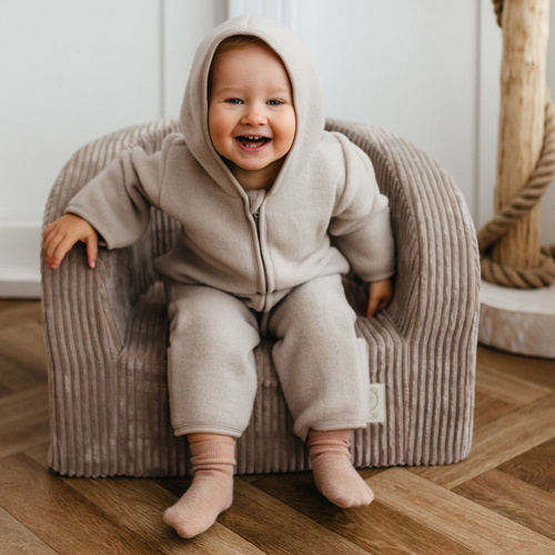 Beżowy kombinezon dziecięcy Eevi z polaru merino – komfort i ciepło